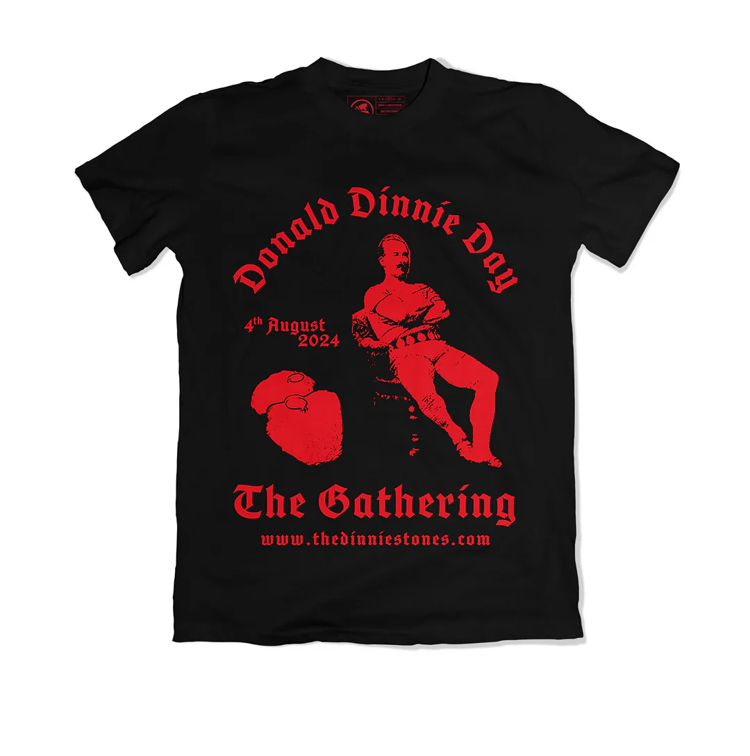 A shirt with a red graphic of Donald Dinnie sitting in a chair. The Dinnie Stones are beside him.