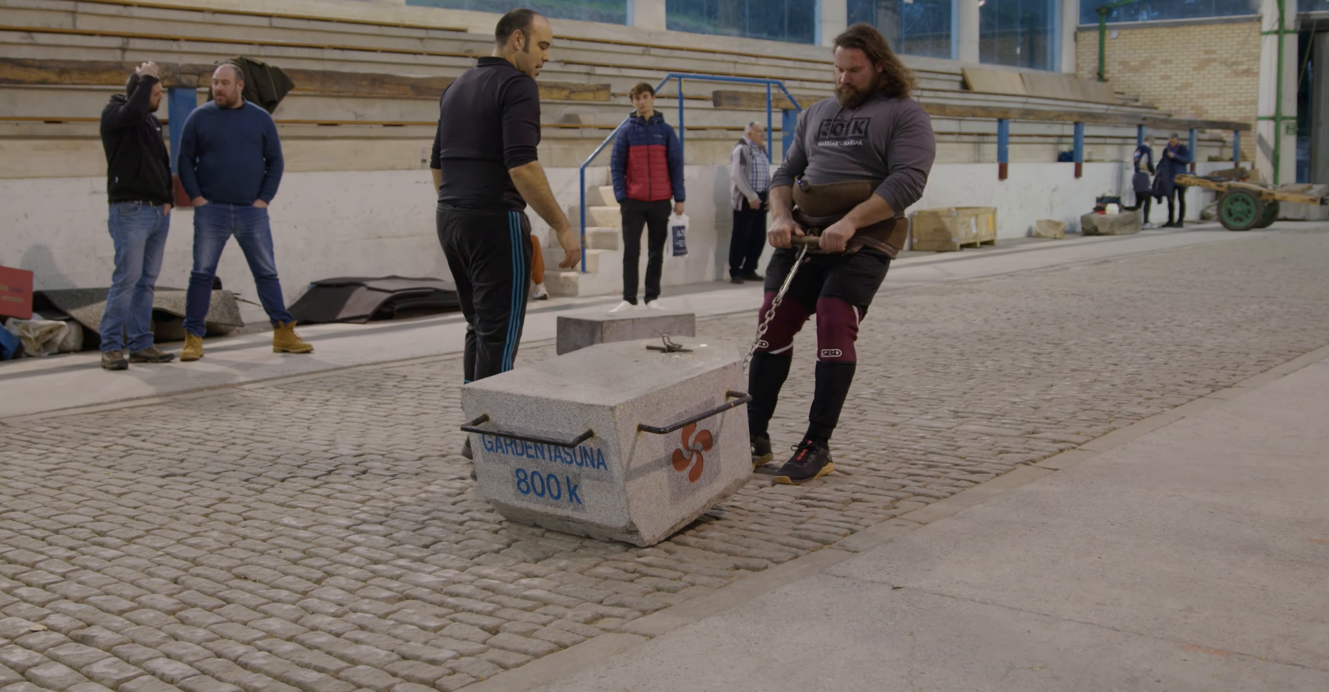 Martins Licis performs a traditional Basque stone drag