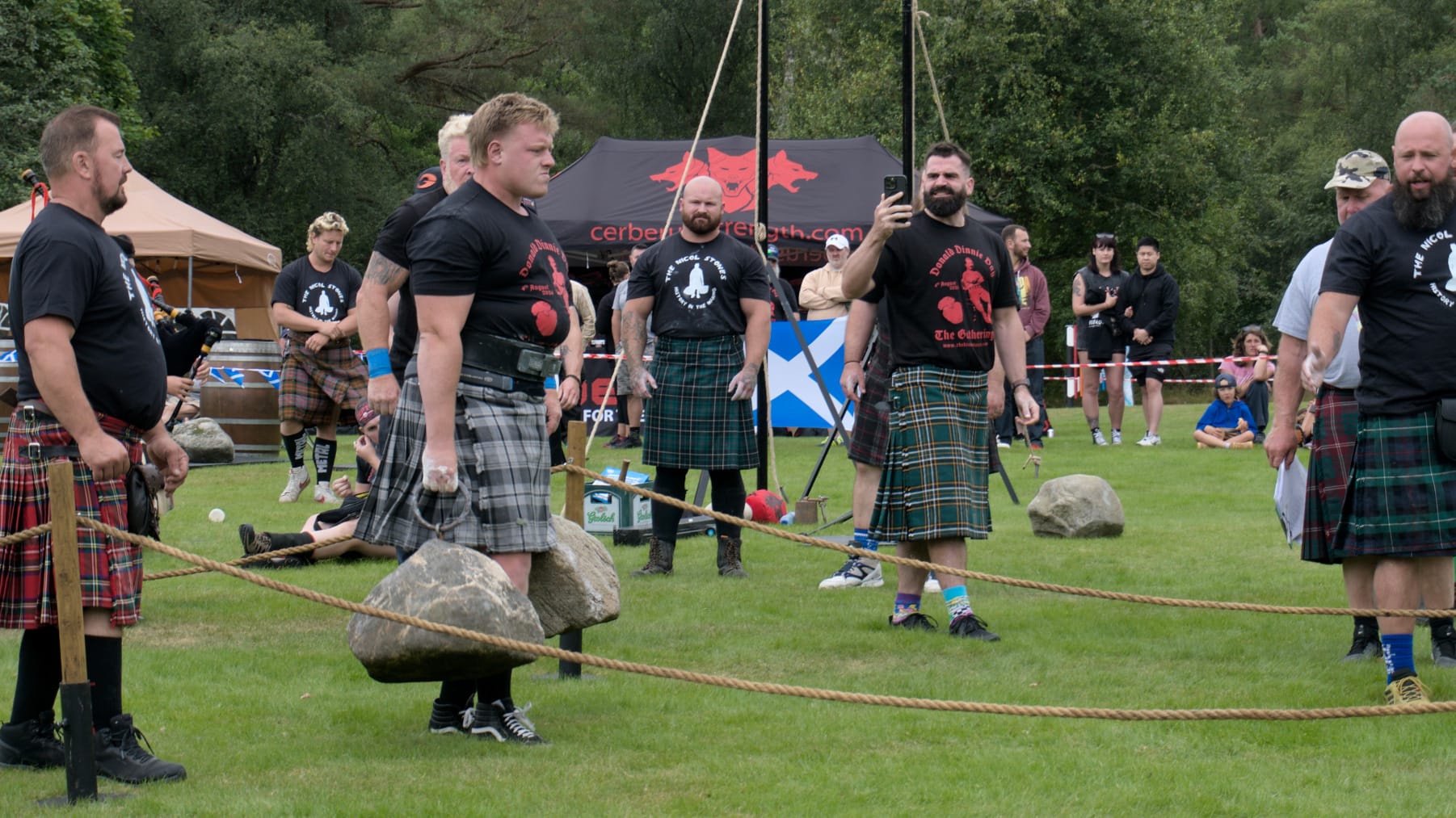 A man carrying the Nicol Walking Stones side-by-side is laser focused on his next steps forward.