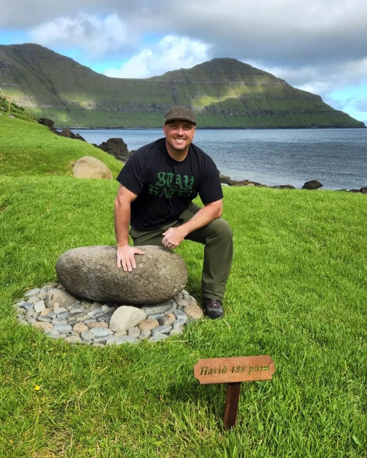 Sean poses next to to 219kg Anfinn's Hav in the Faroe Islands